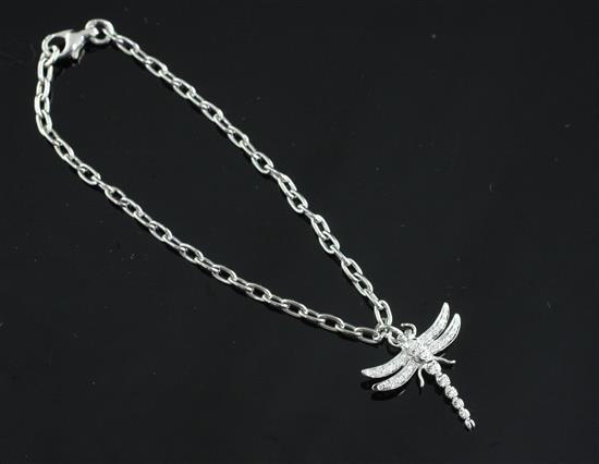 A Tiffany & Co platinum and diamond set single dragonfly charm bracelet, in Tiffany & Co box.